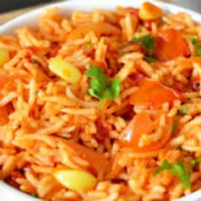 மதிய உணவுக்கு ஏற்ற ருசியான மாங்காய் தக்காளி சாதம் இப்படி செய்து பாருங்க! அசத்தலான சுவையில் இருக்கும்!