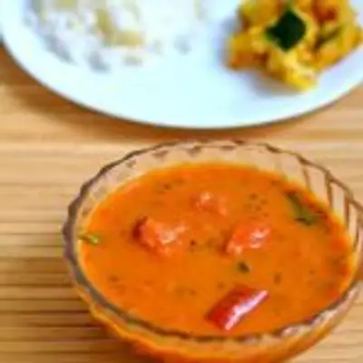ரோட்டுக்கடை ஸ்டைல் ருசியான  தக்காளி குழம்பு இப்படி செய்து பாருங்க அதே சுவையில்!
