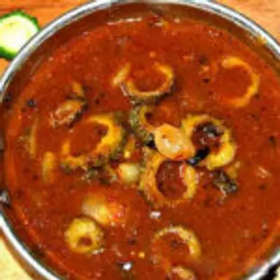 பாவக்காய் புளிக்குழம்பு  இனி இப்படி  செய்தால், குழந்தைகள் கூட விரும்பி சாப்பிடுவாங்க!