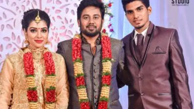 Satna Titus with brother