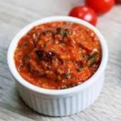 இட்லி, தோசையுடன் சாப்பிட ருசியான தக்காளி பச்சடி இப்படி செய்து பாருங்க!