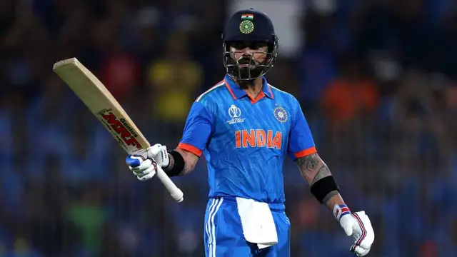 Virat Kohli brought up his fifty in the 26th over